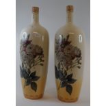 A pair of pottery vases, decorated flowe