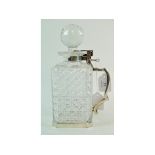 EXTRA LOT: A glass decanter and stopper,