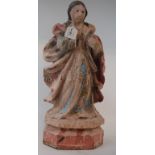 A polychrome and carved wood figure, of