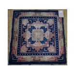 A Chinese rug, with a pink ground, 67 x