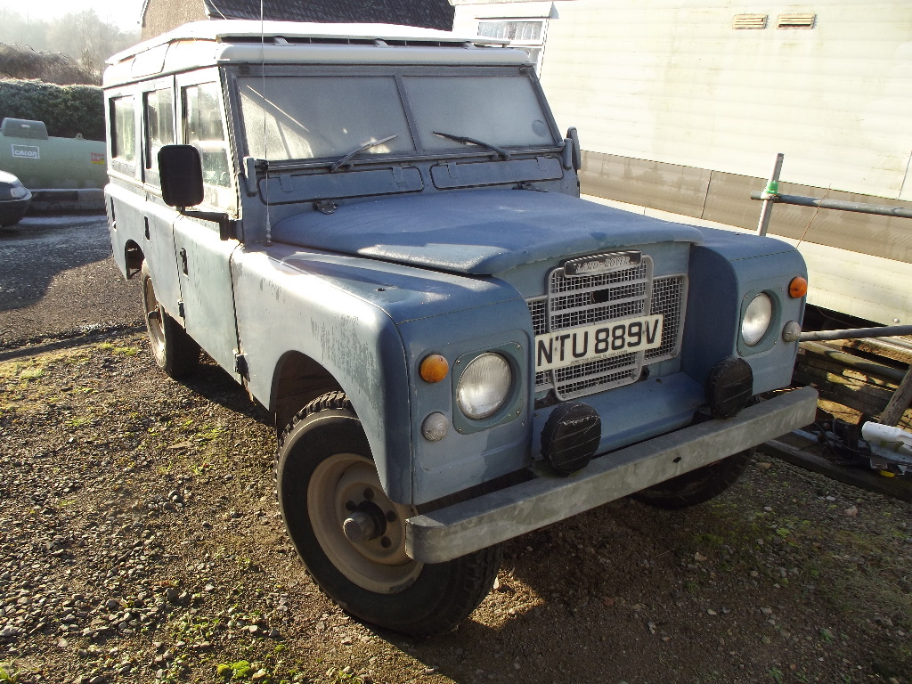 A 1979 Land Rover Series III 109 Inch LWB Safari, registration number NTU 889V, blue.