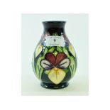 A Moorcroft pottery vase, decorated flow