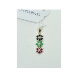 A 9ct gold, ruby, emerald and sapphire t