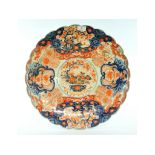 A Japanese Imari charger, decorated flow