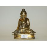 A bronze Buddha, seated (lacks a finger