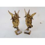 A pair of Burmese brass figures, 26 cm h
