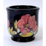 A Moorcroft pottery Magnolia pattern jar