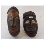 An African carved and stained hardwood m