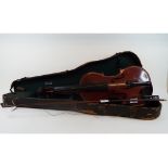 A Czechoslovakian violin, with a bow, an