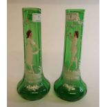 A pair of Mary Gregory style green glass