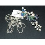 A silver, enamel and pearl necklace, wit