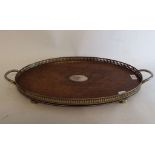 An oak tray, with silver plated mounts,