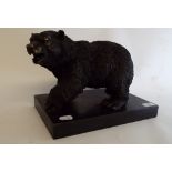 A bronze bear, on a marble base, 23.5 cm