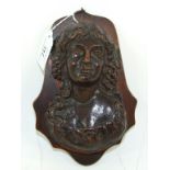 A carved wood bust portrait, of a lady,