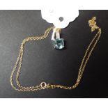 A 9ct gold, blue topaz and diamond neckl