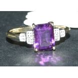 A 9ct gold, emerald cut amethyst and dia