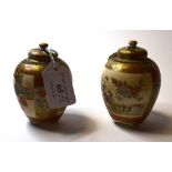 A pair of Japanese Satsuma vases and cov