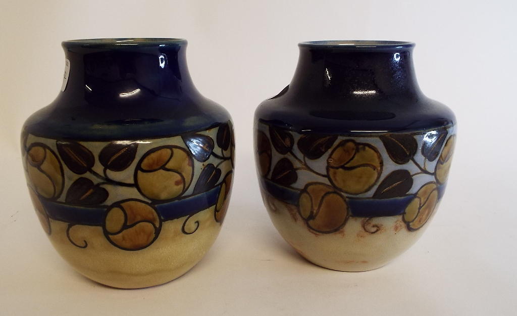 A pair of Royal Doulton stoneware vases,