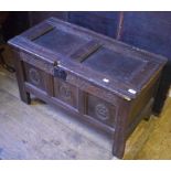 A small 18th century carved oak coffer,