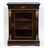 A late Victorian ebonised pier cabinet,