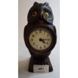 A timepiece, in an owl case, 16.5 cm hig