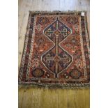 A Persian Chiraz rug, with geometric mot