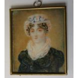 A bust portrait miniature, of a lady wea