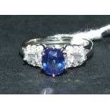 An 18ct white gold, sapphire and diamond