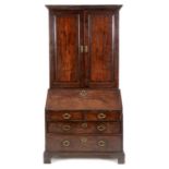 A George III mahogany bureau bookcase, h