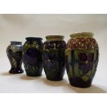 A Moorcroft pottery Finches vase, 10.5 cm high, a similar Bramble vase, 9.