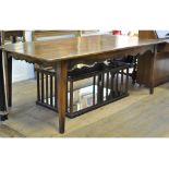 A French farmhouse style table, on tapering square legs,