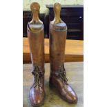 Two pairs of leather hunting boots, with trees,