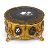 A 19th century gilt metal box, decorated pietra dura panels inlaid flowers,