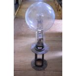 A large lighthouse type bulb, on a metal mount, 64.