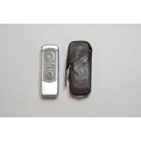 A Minox miniature/spy camera, with a leather case Condition report Dirty,