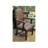 A large oak armchair, with a Jesty,