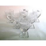 A set of six rummer style wine glasses, with etched grape and vine decoration,