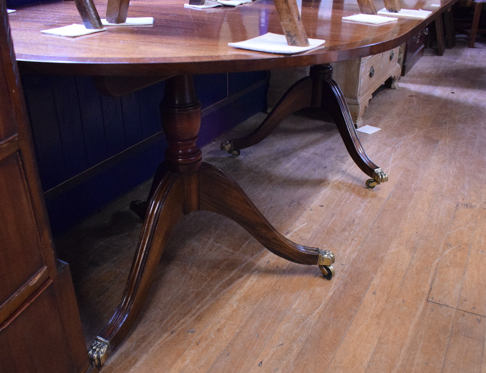 A Regency style inlaid mahogany twin pillar dining table, inset an extra leaf, - Image 3 of 4