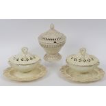 A pair of Leeds Creamware sauce tureens and covers, with pierced and moulded decoration, 16 cm high,