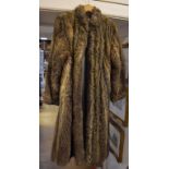 A lady's full length fur coat,