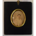 An oval bust portrait miniature, of a lady wearing a bonnet, watercolour on paper,