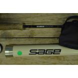 A Sage Graphite III 9 foot 6 inch fly rod,