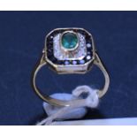 An Art Deco style 9ct gold, emerald, diamond and sapphire ring, approx.