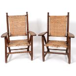 A pair of Arts & Crafts style beech armchairs,