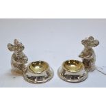 A pair of plated salts, in the form of mice,