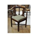 A George III style corner chair,