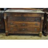 A late 19th century Continental walnut chest, having four long drawers,