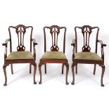 A set of eight George III style mahogany dining chairs,