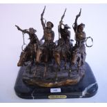 After Frederic Remington, a bronze group, of four cowboys on horseback, Coming Through The Rye,