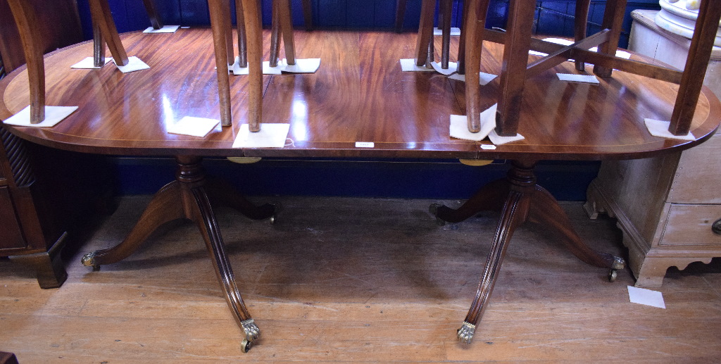 A Regency style inlaid mahogany twin pillar dining table, inset an extra leaf, - Image 2 of 4